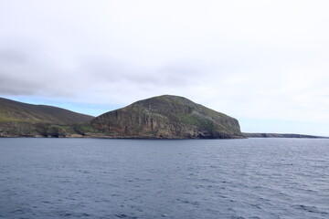view to the Island Foula in the Shetland archipelago of Scotland from the sea