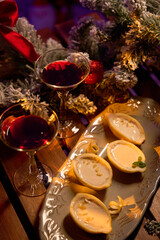 Lemon Posset Dessert with Red Wine in Christmas Setting
