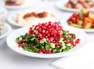Mediterranean and Turkish meyhane cuisine with seafood, mezes, salads, grilled dishes, fresh fish, appetizers and desserts served in a modern restaurant setting.