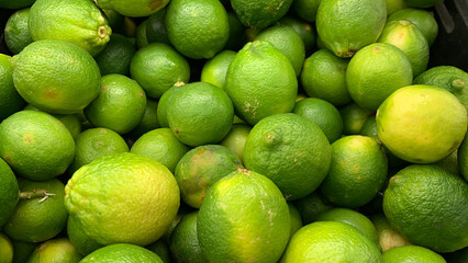 Top view of limes display in a wet market