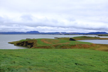 Fototapeta premium Pseudo craters, volcanoes and geothermal areas near Skutustadir at lake Myvatn in Iceland