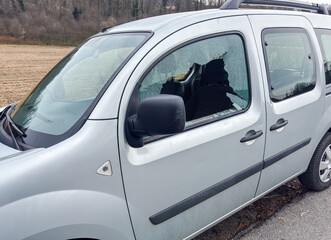 Car window smashed as a result of an act of vandalism