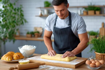 Man baking croissants, shaping dough in kitchen