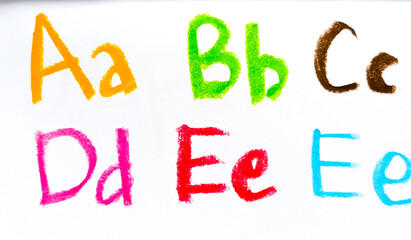 Crayon alphabet isolated over white background, Letters abcd. Colorful hand drawing crayon texture
