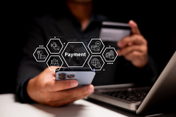 A person holding a smartphone and credit card, engaging in a digital payment process with icons illustrating transaction features.