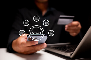 A person making an online payment using a smartphone, with a credit card in hand and digital payment icons displayed.