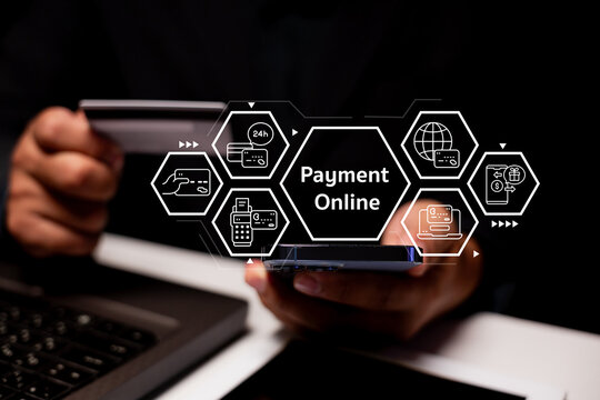 A person holding a smartphone with digital icons representing online payment methods displayed on the screen.