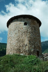 View of a medieval tower in a mountain village Bandujo