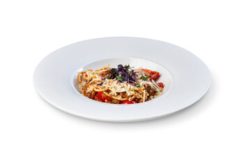 Spaghetti bolognese with cheese and fresh herbs on plate