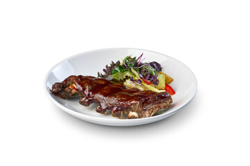 Pork ribs with barbecue sauce and side salad