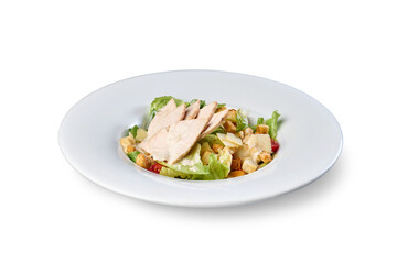Chicken caesar salad in white bowl with croutons