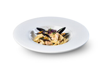 Seafood pasta with mussels and salmon on white plate