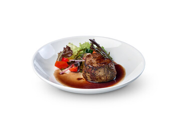 Filet mignon steak with fresh salad and sauce