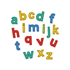Colorful alphabet letters scattered on a white surface for education.