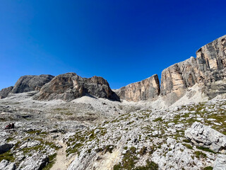Rocky alpine landscape under deep blue sky