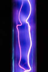 luminous discharges in a gas-discharge bulb in the dark