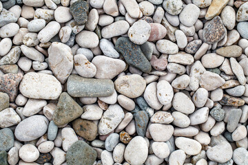 background of pebbles on the beach close-up