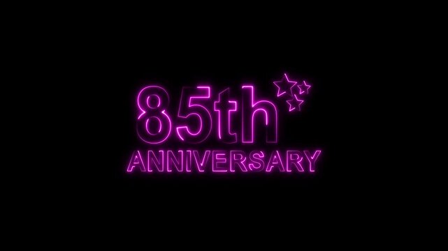 A vibrant purple neon sign illuminates a dark background, proudly displaying 85th anniversary with stylized glowing stars, symbolizing a significant twoyear milestone celebration or event with a moder