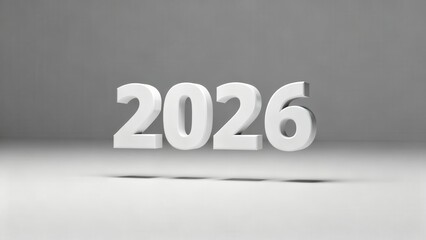 Three dimensional white numerals representing the year twenty twenty six float above a light surface