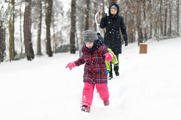 Mom and Two Kids Have Completed Their Sledding