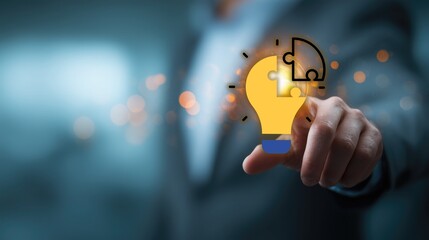 Business hand interacting with glowing puzzle-piece lightbulb icon—representing problem-solving, innovative idea completion, creative strategy, and business solution development in professional worksp