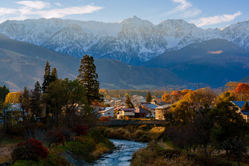 Beautiful scenery of Oide Park in Hakuba Village, Nagano, gently brushed by the warm evening sunlight amid the autumn season.