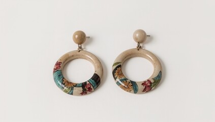 Ceramic glazed earrings delicate painted artistic matte contemporary flair on plain white background
