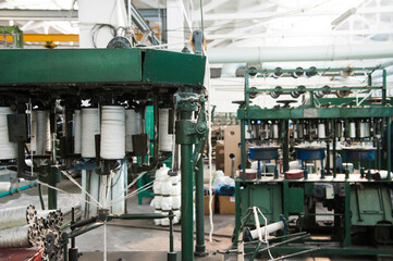 Yarn thread running in the machine