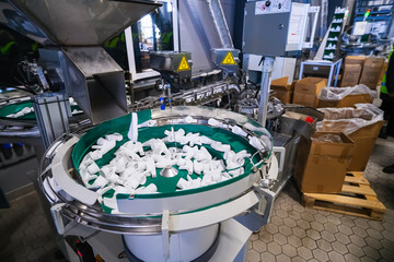 The production process of plastic spray bottles intended for household chemicals.