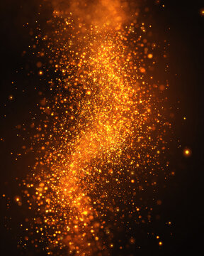 Light particles dance in the dark creating a glowing display during a festive event in the evening 