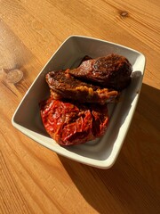 Dried eggplant stuffed with rice, tomato and olive oil known as dolma.