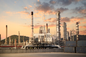 Obraz premium Oil and Gas Industrial zone,The equipment of oil refining,Close-up of industrial pipelines of an oil-refinery plant,Detail of oil pipeline with valves in large oil refinery.