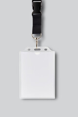 Blank ID badge attached to a black lanyard isolated on white background