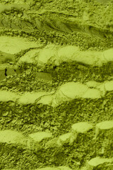 Matcha tea, matcha powder as a background.
