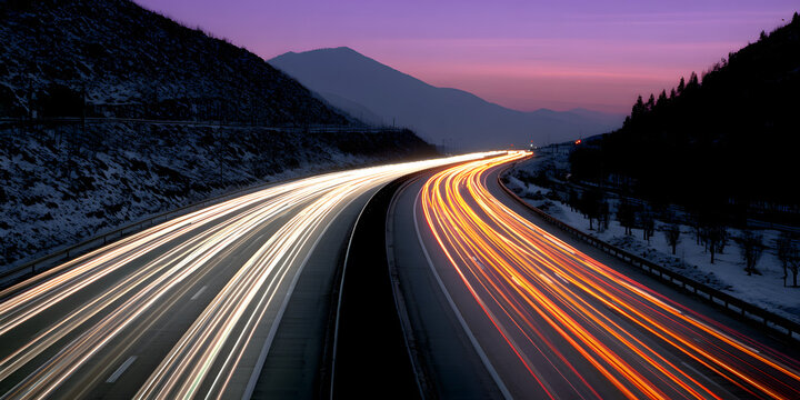 Colorful abstract wave pattern with smooth flowing lines in pink, purple, orange, and gold tones on a black background, resembling a digital energy stream or futuristic motion.
- Powered by Adobe