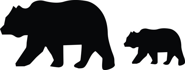 Silhouette of a mother bear and cub walking side by side