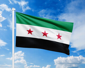 The Syrian independence flag waves dynamically against a bright sky, showing its green, white, and black stripes with three vivid red stars. Sharp lighting and clear motion 