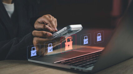 Cybersecurity and digital protection in cyberspace. Using smartphone and laptop with lock icons, Privacy risks, data security, firewall defense, and secure access in digital environments.