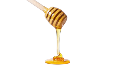 Honey dripping from wooden honey dipper on white background