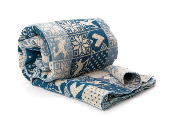 Wool blanket with winter and christmas motifs isolated on white background