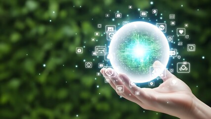 Hand holding glowing sphere with technology icons and green nature background innovation
