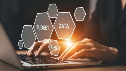 Person Typing on Laptop with Digital Hexagons of Business Terms technology data