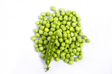 green peas on a white