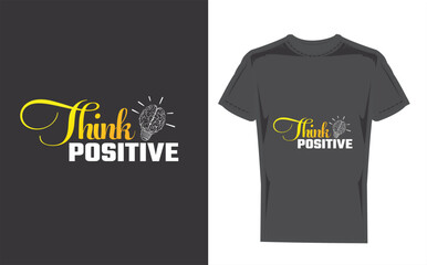 Black tshirt with think positive graphic design mockup on wooden background