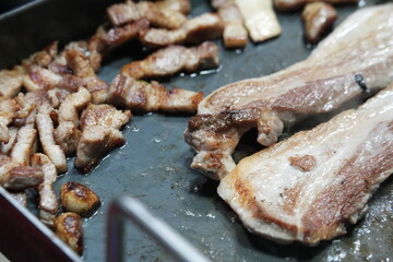Grilled Korean samgyeopsal pork belly with crispy fat close-up