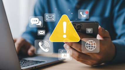 Person holding smartphone with warning icon and digital communication symbols floating