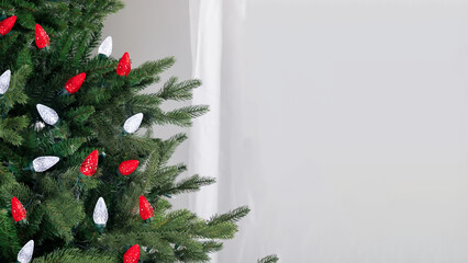 Red and pure LED lights on a Christmas tree.