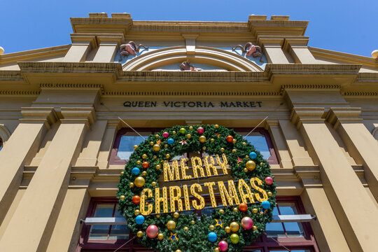 MELBOURNE, VICTORIA, AUSTRALIA - December 25, 2018: Festive Christmas Wreath on Historic Queen Victoria Market Facade