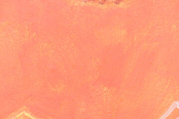Abstract grungy background with old rose, orange, coral, and salmon brushstrokes
