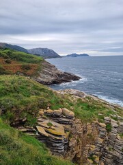 Rocks and flysches of the Bay of Biscay on a cloudy day. Basque country